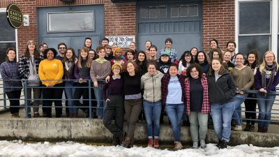 2019 Corps Members smiling in a large group together.