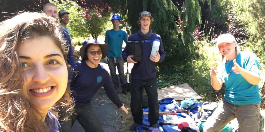 Corps Member, Abigail J. Labadan, smiling with her fellow Corps Members. 