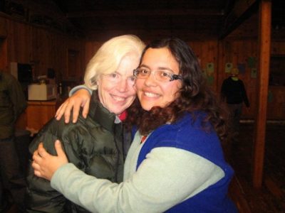 Mila hugging EarthCorps homestay host Ann Lawrence